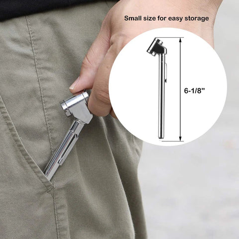 Pencil-style tire pressure gauge with dual head chuck, chrome steel body, 6-1/8 in long, held near pocket.