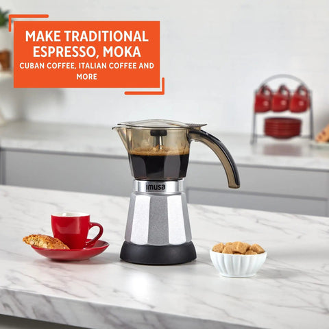Heavy Duty Cast Aluminum Electric Espresso Maker Brews Three Or Six Cups Slick Silver Design on a countertop with coffee and cookies