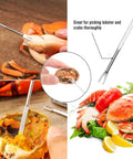 20 Pack Seafood Crackers And Tools Set Party Ready Gear includes crab fork extracting meat from shell with seafood platter.