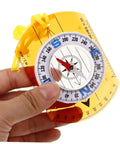 Hand holding orienteering compass pointer lightweight hiking navigation tool for outdoor adventures with luminous coating