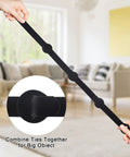 Hands holding Reusable Cable Ties Organizer Set For Home Office And Tech Gear, Black Cable Straps, living room background