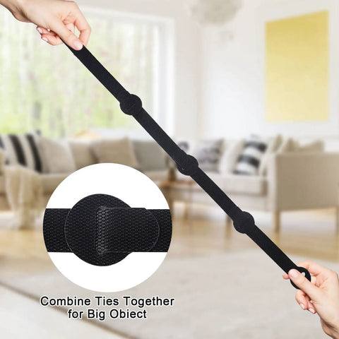 Hands holding Reusable Cable Ties Organizer Set For Home Office And Tech Gear, Black Cable Straps, living room background