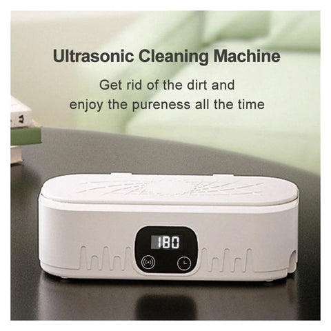 Knockout Portable Ultrasonic Cleaner For Glasses And Jewelry Using High Frequency Vibration And Eco Friendly Deep Wash Tech To Make Your Treasures Look Slick And Sparkling Fresh In Pink on a table with a timer display.