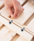 Boss Level Figure Eight Fastener Clips 20 Pack Heavy Duty Steel Desk Connectors shown during installation on wooden tabletop.