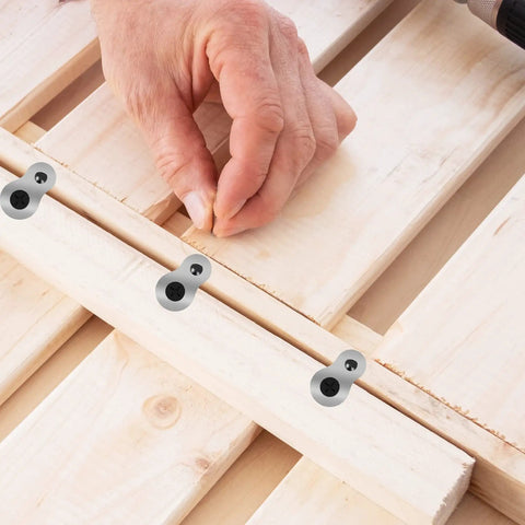 Boss Level Figure Eight Fastener Clips 20 Pack Heavy Duty Steel Desk Connectors shown during installation on wooden tabletop.