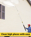 Man using Telescoping Pressure Washer Wand With 24 Ft Reach No Ladder Needed Extension Wand on house siding