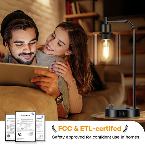 Couple using tablet beside Industrial Table Lamp With USB A And C Ports And Outlet Fully Stepless Dimmable Modern Nightstand Lamp