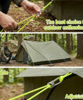 Ultra Lightweight Rope Tightening Tool With Roller Cam Four Pack For Camping And Boating Grab And Go No Knots Needed Locks Rope Instantly Ultra Compact Tensioner For Tarps Outdoor Gear Hiking And Emergency Fixes used to secure a tent in a forest setting.