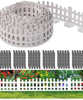 Arched White Garden Edging 33 Feet Long With 60 Plastic Stakes Flexible No Dig Lawn Border on grass with flower backdrop