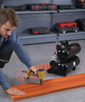 Heavy Duty Oil Free Air Compressor 4.6 Gallon Steel Tank 1 HP 120 Psi Max Ultra Quiet Portable Workhorse For Auto Repair Tire Inflation And Spray Painting That Delivers No Sweat Daily in use with a nail gun on wood.