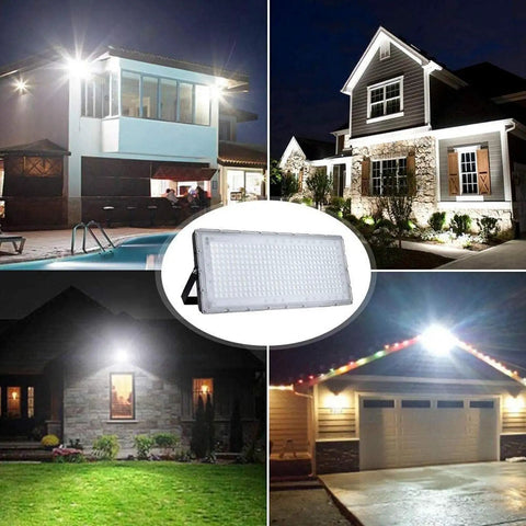 JUDYSSY 6 Pack Led Flood Light Outdoor illuminating homes at night, showcasing 300W 24000Lm lights with adjustable brackets.