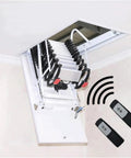 Slick Remote Control Electric Attic Stairs Telescopic Loft Ladder with remote controls and motorized assembly mounted in ceiling.