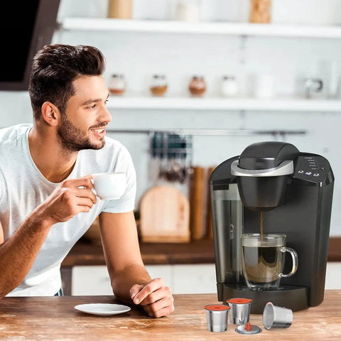 Two Pack Reusable K Cups For Keurig 1.0 And 2.0 Coffee Makers on kitchen counter with man enjoying coffee