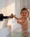 Heavy Duty Industrial Pipe Handrail For Indoor Stairs Wall Mount Metal Safety Rail Solid Staircase Grab Bar, used by a smiling child in a bath.