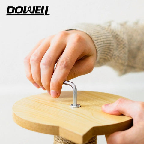 Person using an Allen wrench to assemble wooden furniture, demonstrating tool use from the 185 Piece Tool Set With General Household Hand Tool Kit