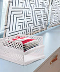 Sick Plastic Drawer Storage Baskets For Closets And Bedrooms That Stack Crisp on a countertop holding folded towels.