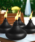 Two Pack Metal Table Top Torches With 24.5 Ounce Citronella Fuel Capacity Refillable Outdoor Flame Light Lanterns on patio table
