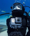 Scuba diver using Super Suit Dive Housing For HERO7 HERO6 HERO5 Clear One Size With Two Waterproof Backdoors at 60m depth