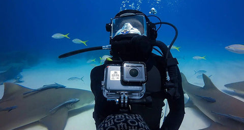 Scuba diver using Super Suit Dive Housing For HERO7 HERO6 HERO5 Clear One Size With Two Waterproof Backdoors at 60m depth
