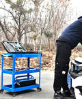 All Purpose 2 Inch Rubber Caster Wheels Set Of Four With Locking Brakes And Threaded Stem on a blue tool cart in use.