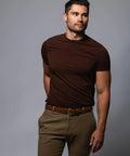 Individual wearing Mens Belt With Double Stitch Detailing And Genuine Leather In Tan, Size 40, showcasing casual style