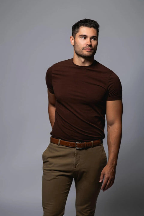Individual wearing Mens Belt With Double Stitch Detailing And Genuine Leather In Tan, Size 40, showcasing casual style