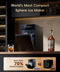 Big League 2.4 Clear Ice Ball Maker Compact Countertop Design with whiskey, producing crystal spheres.