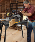 Rock Solid Heavy Duty Miter Saw Stand With Extension Rollers Eight Level Height Adjustable Power Tool Table 300 Pound Capacity in use with a Dewalt saw.