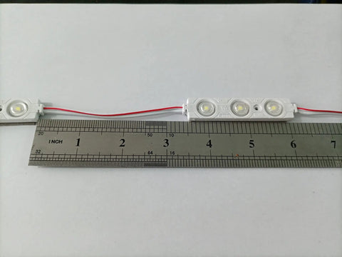 200 Pack DC12V White 6500K 3 LED Sign Module Back Light with ruler for scale, showing waterproof design and cuttable feature