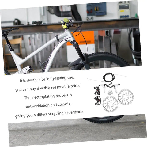 Top Tier Bike Disc Brake Rotors One Set Lightweight Aluminum Construction with mountain bike components in a workshop setting.