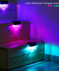 Solar Deck Lights 3000K Warm White Color Changing Outdoor Fence Lights on wooden steps, emitting colorful glow, 6 Pack shown