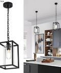 One Light Farmhouse Pendant Light With Black Metal Cage And Glass Shade, Adjustable Chain, shown in modern kitchen setting