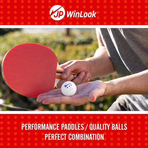 Person holding ping pong paddle and ball from Four Paddle Ping Pong Set With Carry Case And Eight Balls Portable Table Tennis Paddles
