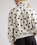 Back view of Polka Dot Half Zip Sweatshirt For Women, Oversized Fleece Pullover With Pockets, Long Sleeve Quarter Zip Casual Hoodie