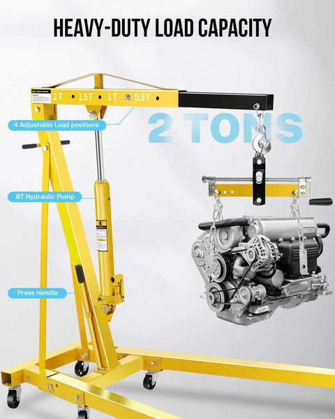 Heavy Duty Bad Boy Hydraulic Shop Crane Doubles As An Engine Hoist with adjustable load positions and engine attached.