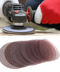 Premium 50 Pack Mesh Sanding Discs With Hook And Loop Backing For Drywall Plus Wood And Metal, Dust Free Grit Design Clogs Less And Lasts Longer To Crush It On Any Tough Job Without The Mess, shown in use with a sander.