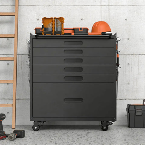 Heavy Duty Rolling Tool Chest With Six Full Extension Drawers And Whisper Quiet Tracks, Easy Glide Wheels Make Tackling Garage Grunt Work A Breeze, Rust Resistant Steel Organizer Built Tough For Real Jobs, side view with tools on top.