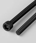 Close-up of 120 Piece Rock Solid M3 X 12MM Hex Socket Head Cap Screws Bolt Set In 12.9 Grade Alloy Steel with black finish.