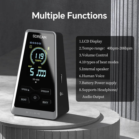 Digital LCD Metronome For Piano Guitar Drums Violin Ukulele Practice With Adjustable Tempo And Beat on a table