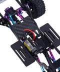 Carbon Fiber LCG Chassis Frame Rail Kit for 1/24 RC Crawler shown installed with visible carbon fiber texture and shock mounts