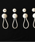 4-pack of 8-Inch White Shock Cord And Fastener Clips For Canvas Covers, marine-grade, displayed on black background.