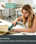 Woman using Lightweight Cordless 4V Electric Shears That Slice Fabric And Cardboard Like Butter on fabric with ergonomic grip.