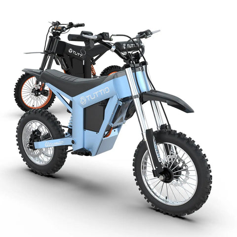 Full Send Electric Dirt Bike Built Around A Mean 2000W Motor And Tough 21Ah Battery Hits 37 Mph Using Three Speed Modes side view of blue electric dirt bike with black model behind.