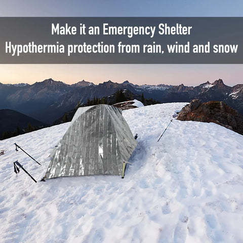Emergency Silver Foil Mylar Blanket 12 Pack For Outdoors Hiking Survival Marathons And First Aid Kits in snowy mountain setup