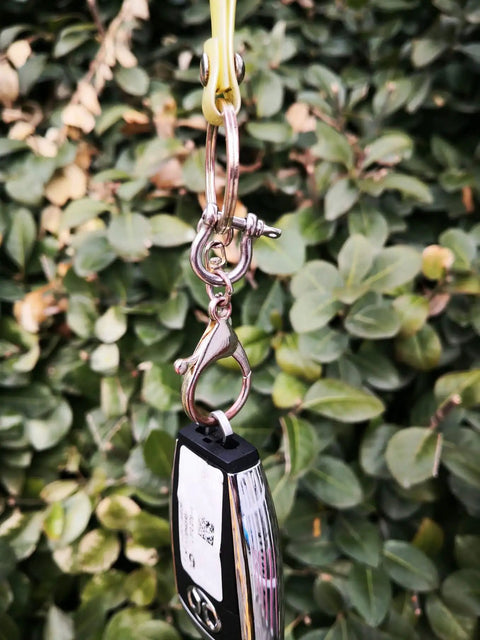 Built Like A Tank Marine Grade 316 Stainless Steel Bow Shackles 3Mm Mini Links for Paracord Crafts and Dog Tags hanging from keychain.