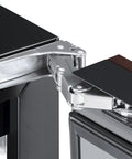 Close-up of hinge mechanism on Heavy Duty 2.45 Cubic Foot Frost Free Upright Commercial Freezer for durability.