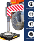 Four Piece Heavy Duty RV Jack Pads With Easy Grip Handles 12 X 12 X 1 Inch supporting a stabilizer leg under an RV wheel.