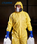 Technician in yellow suit wearing Workhorse PVC Chemical Resistant Gloves 6 Pairs Grippy Non Slip Rubber Work Gloves for acid alkali protection