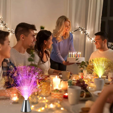 2 Pack Fiber Optic Lamp With Cone Base LED Color Changing Lights on dining table during family gathering for calming mood lighting.