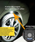Magnetic COB Keychain Work Light With 7 Modes, 1600 Lumens illuminating car wheel with magnetic back attachment